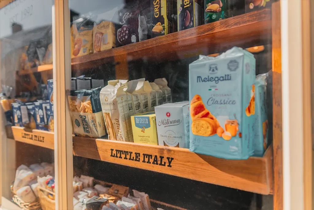 Authentic Italian pantry products displayed in the Little Italy deli window on Goodramgate in York