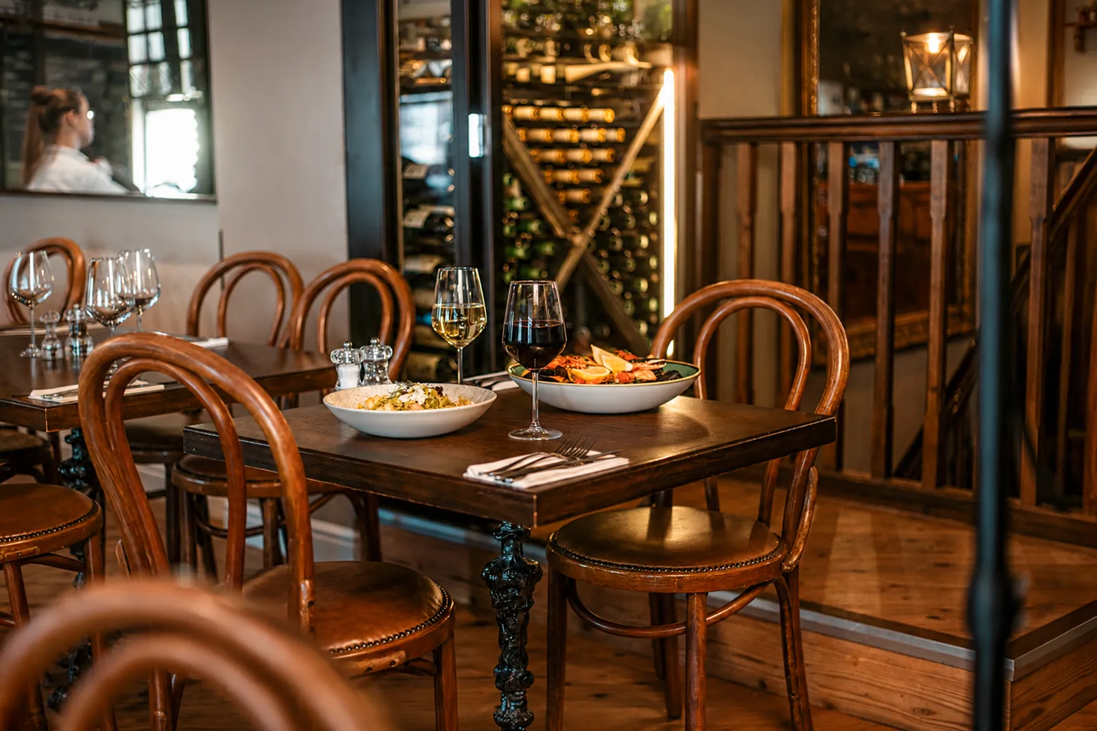 Table set with homemade pasta, seafood dishes and Italian wines at Little Italy restaurant in York