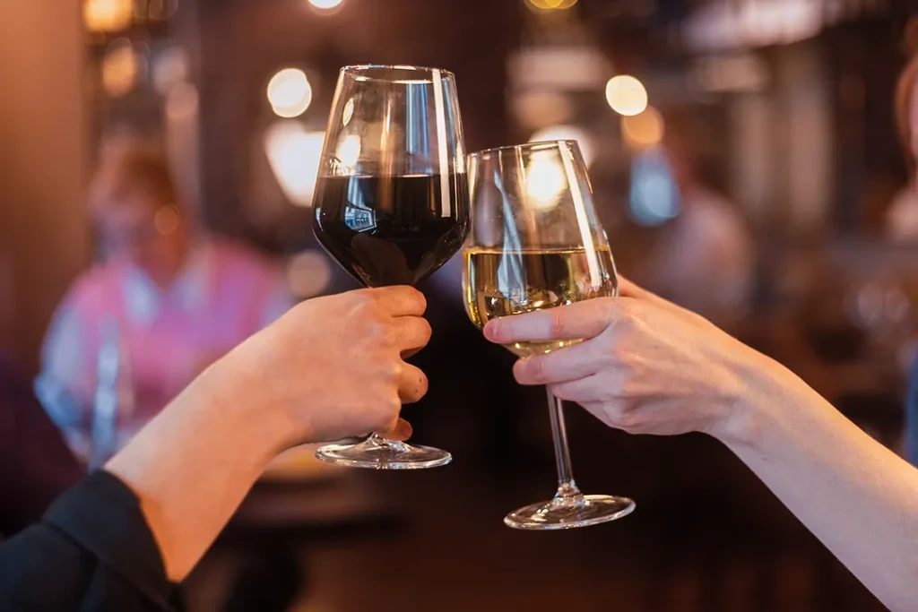 Guests toasting with red and white wine at Little Italy in York